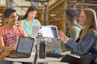 Students talking in library