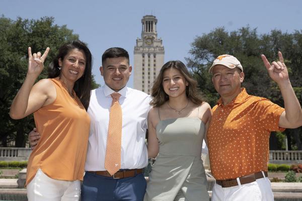 Parents in front of tower